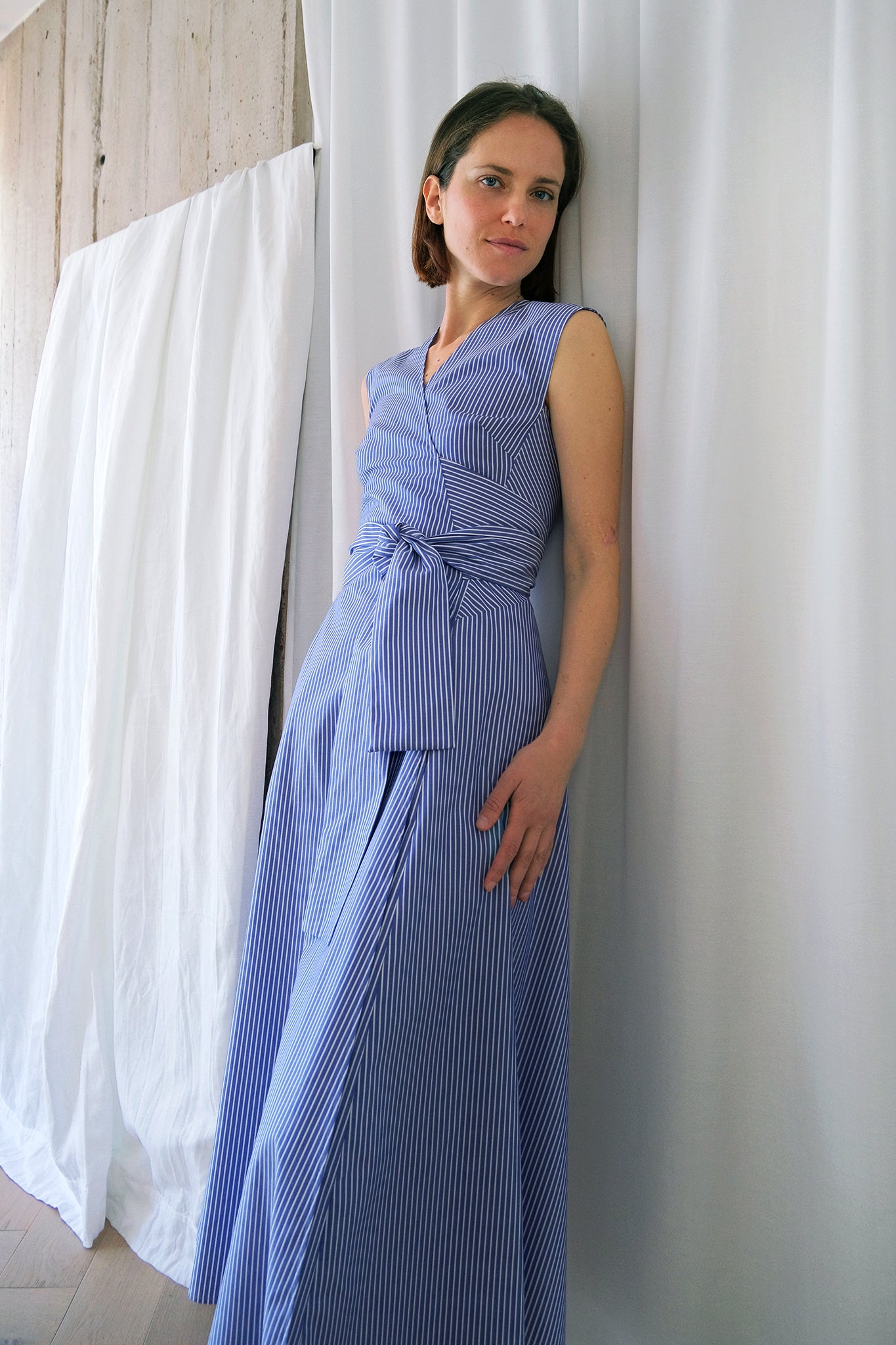 The Dualist Wrap Dress in Blue Striped Cotton Oxford The Array The Dualist Wrap Dress in Blue Striped Cotton Oxford The Array